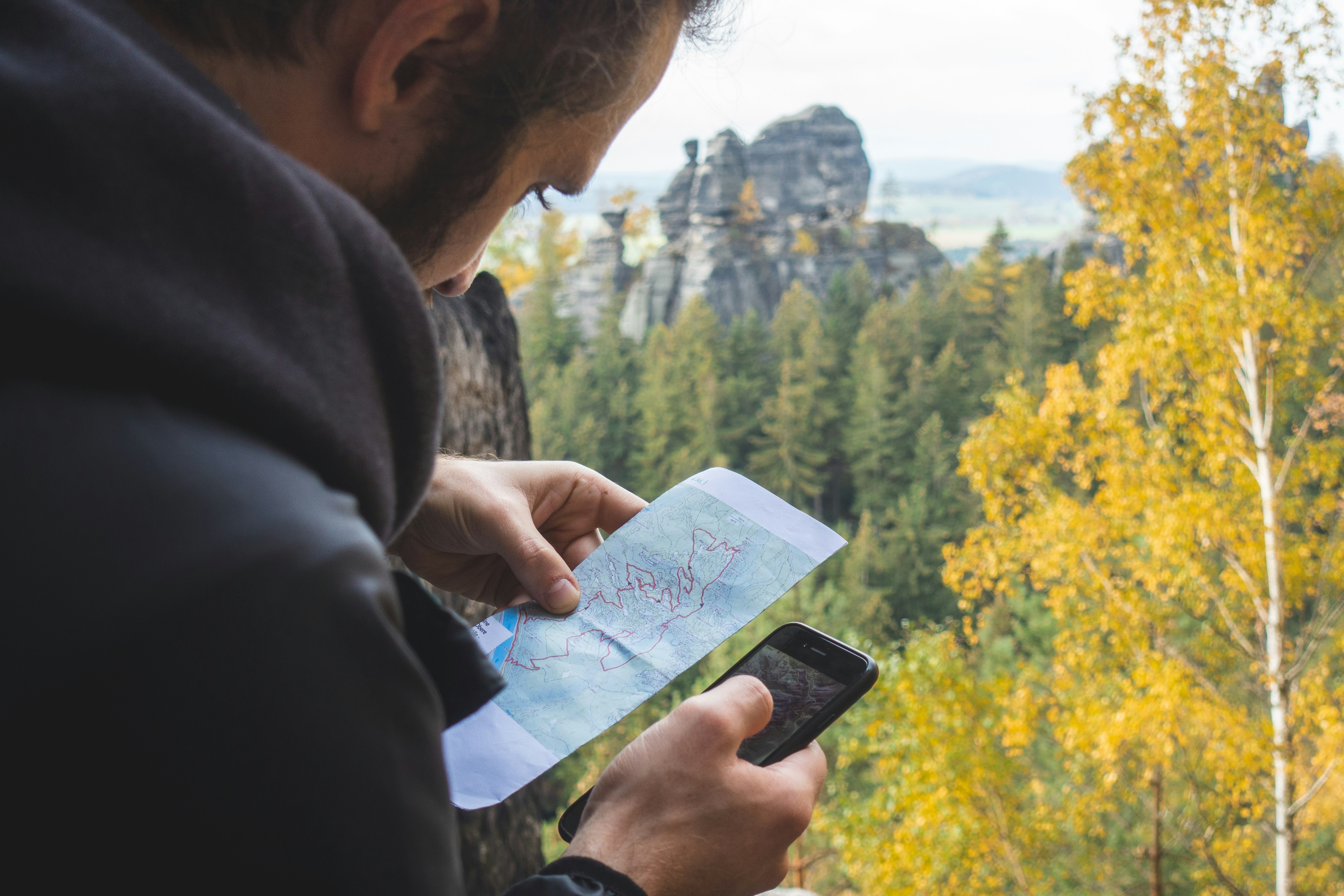Traveler planning a trip on a smartphone — mini-app distribution
